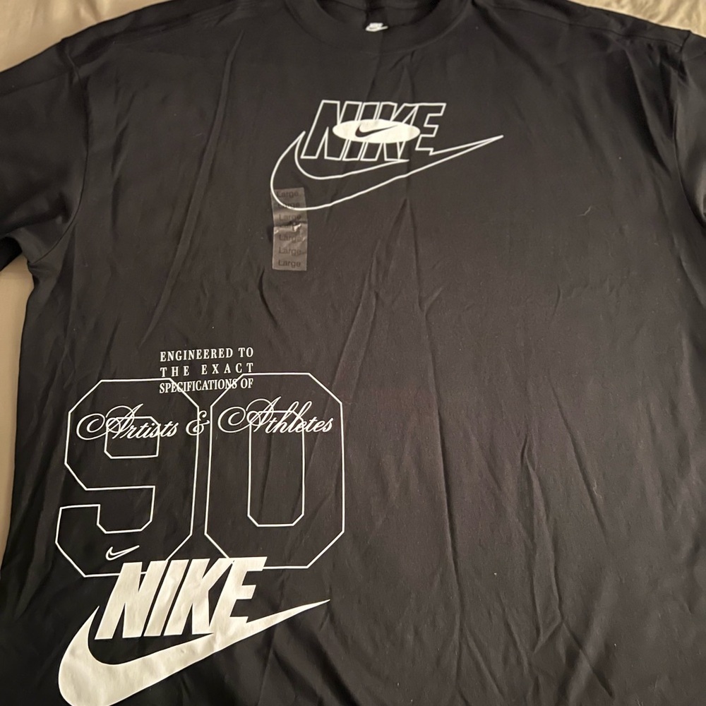 Nike Black Tee with White Graphics. NEW WITH TAGS